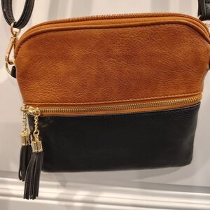 Chic Tan and Black Crossbody Bag with Gold Accents